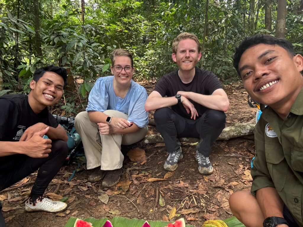 Escape to Sumatra local guides preparing guests for jungle trekking
